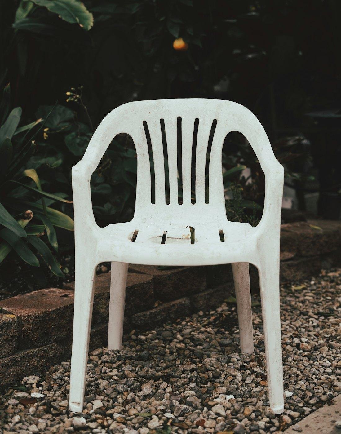 White moulded plastic chair
